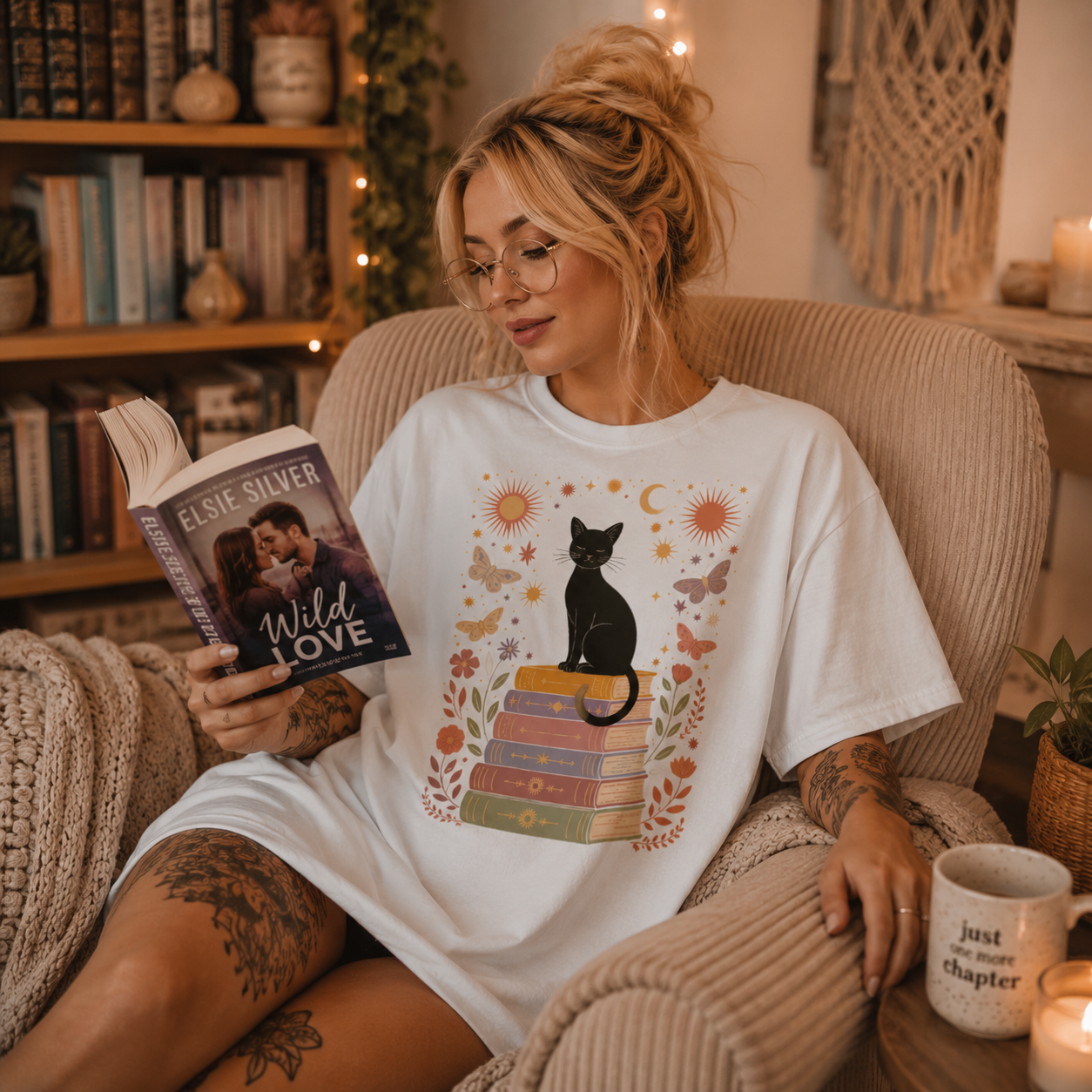 black cat book shirt, book lover t-shirt, witchy cat shirt, cat and books graphic tee, celestial bookish shirt, cozy reader shirt, bibliophile gift, black cat lover tee, magical reading shirt, botanical book design, moon and sun t-shirt, whimsical book lover apparel, romance reader shirt, cozy bookroom aesthetic, oversized sleep shirt, alternative bookish fashion, cottagecore reader tee, literary cat shirt, comfort colors book tee, Merloan book lovers shirt