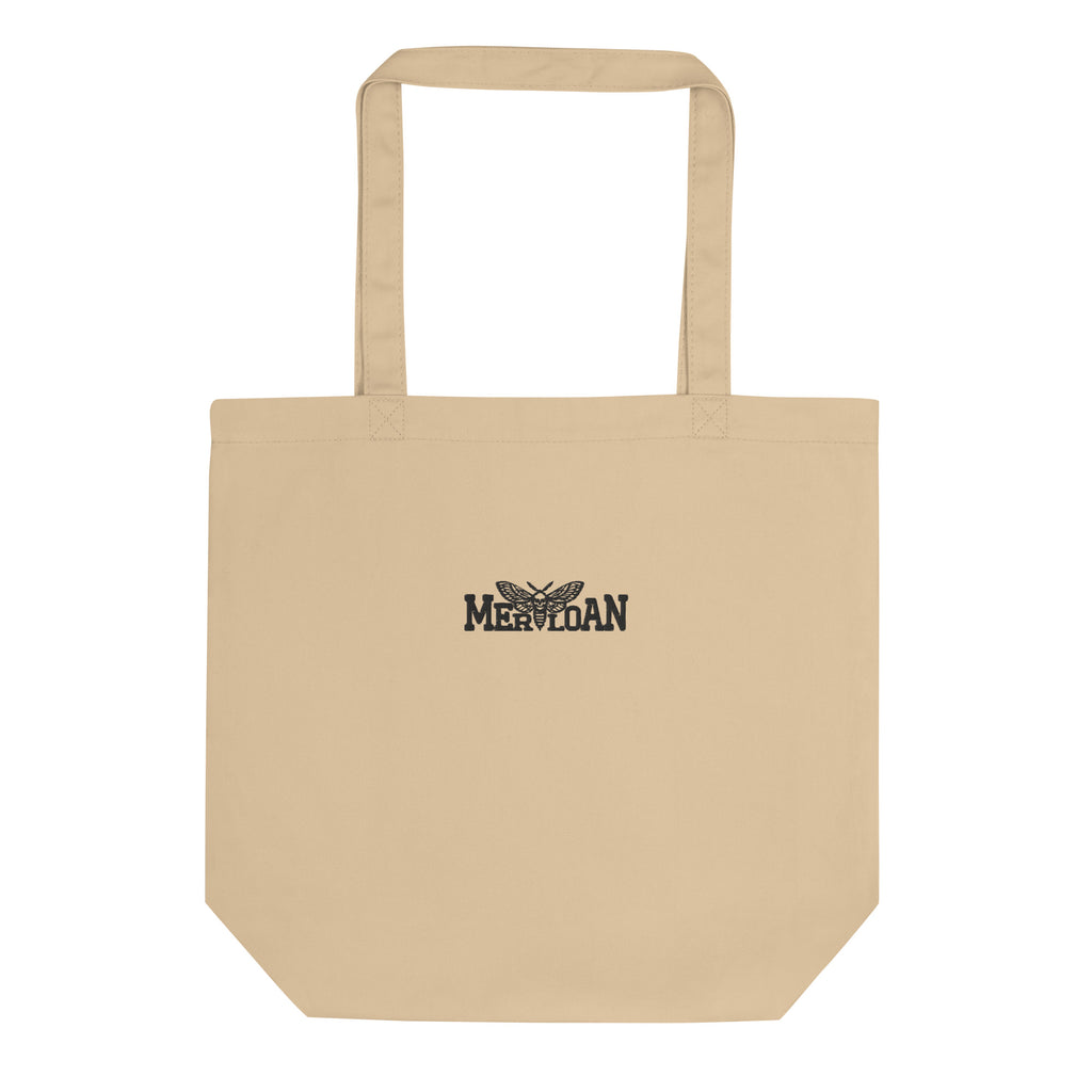natural canvas tote bag, embroidered logo tote, Merloan tote bag, reusable shopping bag, organic market tote, eco friendly grocery bag, beige canvas shopper, rock style tote bag, alternative fashion accessory, sustainable shopping bag, minimalist logo bag, cotton canvas tote, reusable market bag, neutral everyday tote, embroidered canvas bag, eco conscious accessory, alternative women’s style, grocery shopping tote, sturdy shoulder bag, natural fabric shopper, rock inspired accessory, Merloan merch bag, bei