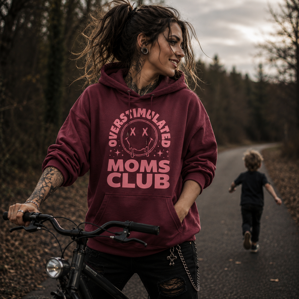overstimulated moms club hoodie, overstimulated mom hoodie, mom life hoodie, funny mom sweatshirt, chaotic mom hoodie, motherhood humor hoodie, tired mom hoodie, mommy club hoodie, funny mama hoodie, cozy mom hoodie, pouch pocket hoodie, classic streetwear hoodie, soft cotton face hoodie, relaxed mom style, Merloan mom hoodie