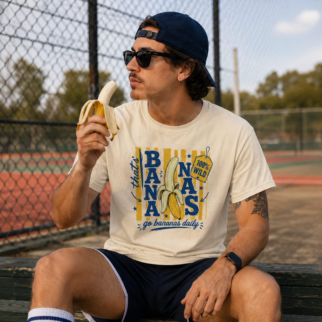 that's bananas shirt, bananas t-shirt, go bananas daily tee, funny banana shirt, wild banana t-shirt, fruit graphic tee, banana lover shirt, funny food shirt, chaotic humor tee, playful quote shirt, tropical fruit t-shirt, quirky graphic tee, heavyweight cotton t-shirt, garment-dyed tee, relaxed fit funny shirt