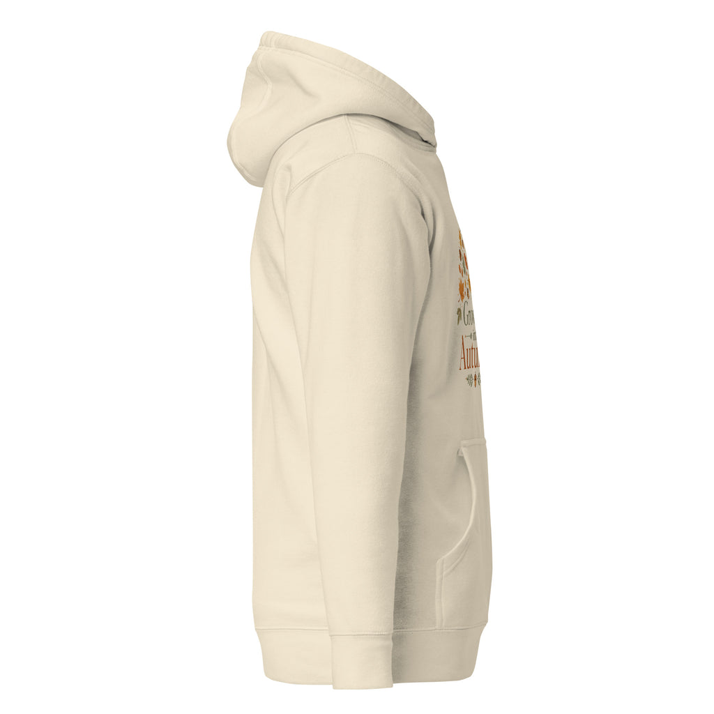 growing into autumn hoodie, autumn hoodie, cozy fall hoodie, seasonal hoodie, botanical autumn hoodie, fall graphic sweatshirt, chilly day hoodie, autumn outfit, cozy autumn style, fall fashion hoodie, warm hooded sweatshirt, pouch pocket hoodie, soft cotton face hoodie, Merloan autumn hoodie, relaxed fall hoodie